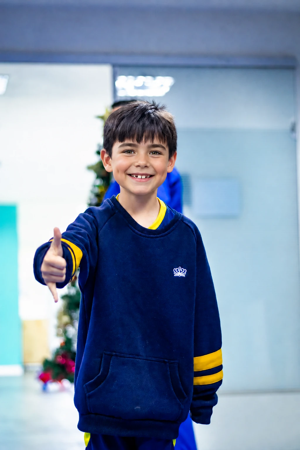 A smiling student at a school community activity